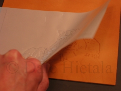 Transferring the pattern with tracing film. Other products, including paper, can be used to transfer the pattern onto leather.